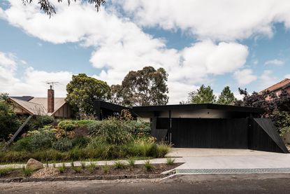 the exterior of ha ha haus, an Alphington house with a sheltered entrance