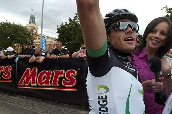 Simon Gerrans acknowledges support in the crowd before a post-race interview with SBS reporter Sophie Smith.