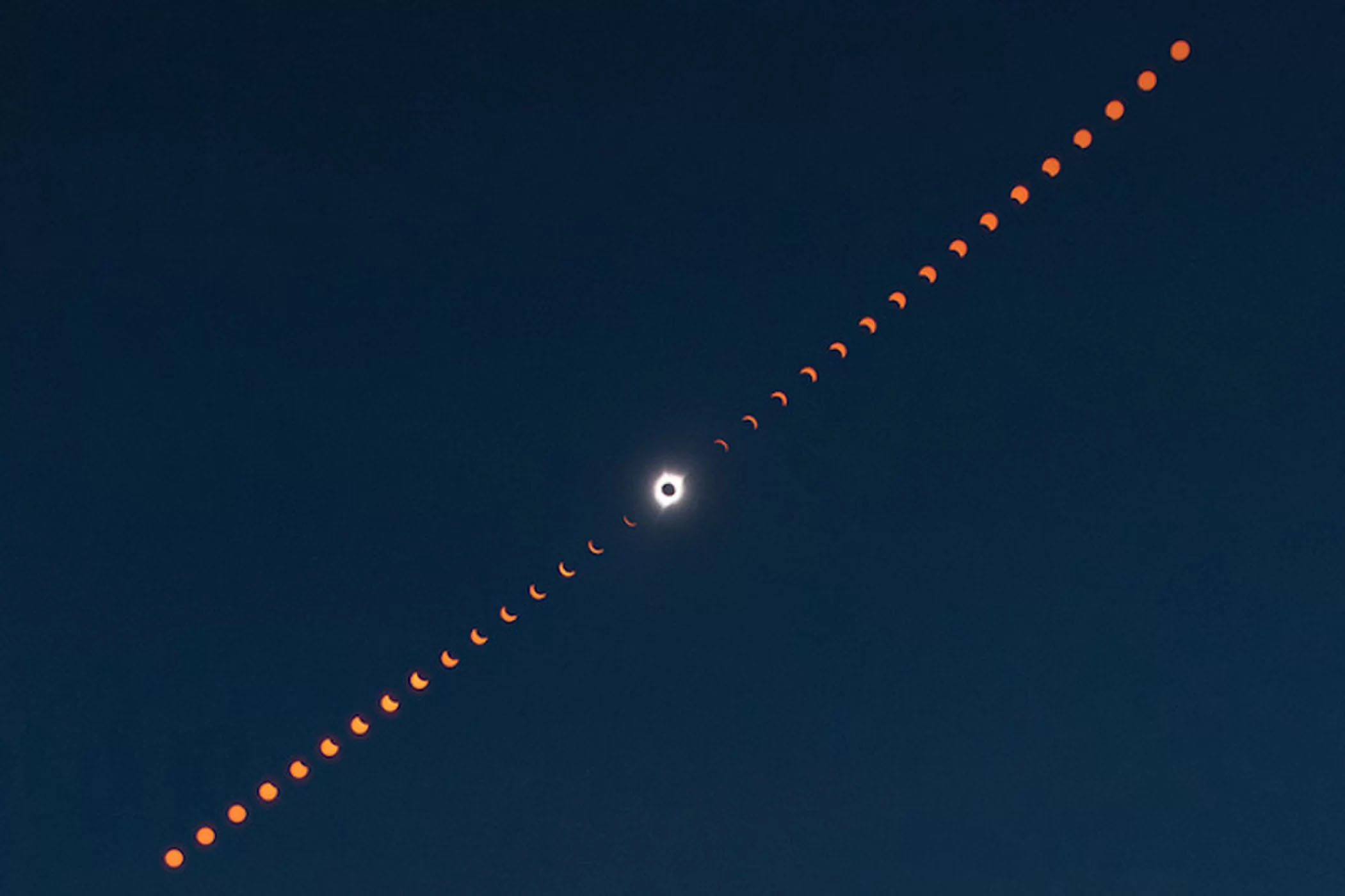 This composite image shows the progression of a total solar eclipse over Madras, Oregon, on Aug. 21, 2017.