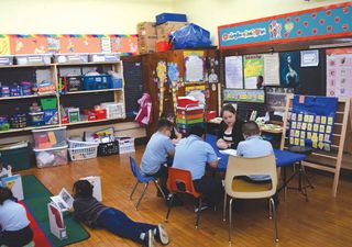 Amy Black, first-grade teacher, leads centers in her classroom at Our Lady of Hungary School.