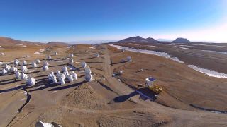 The final antenna for the Atacama Large Millimeter/submillimeter Array (ALMA) project is here seen arriving to the high site at the ALMA Observatory, 5000 metres above sea level. Its arrival completes the complement of 66 ALMA antennas on the Chajnantor Plateau in the Atacama Desert of northern Chile — where they will in future work together as one giant telescope.