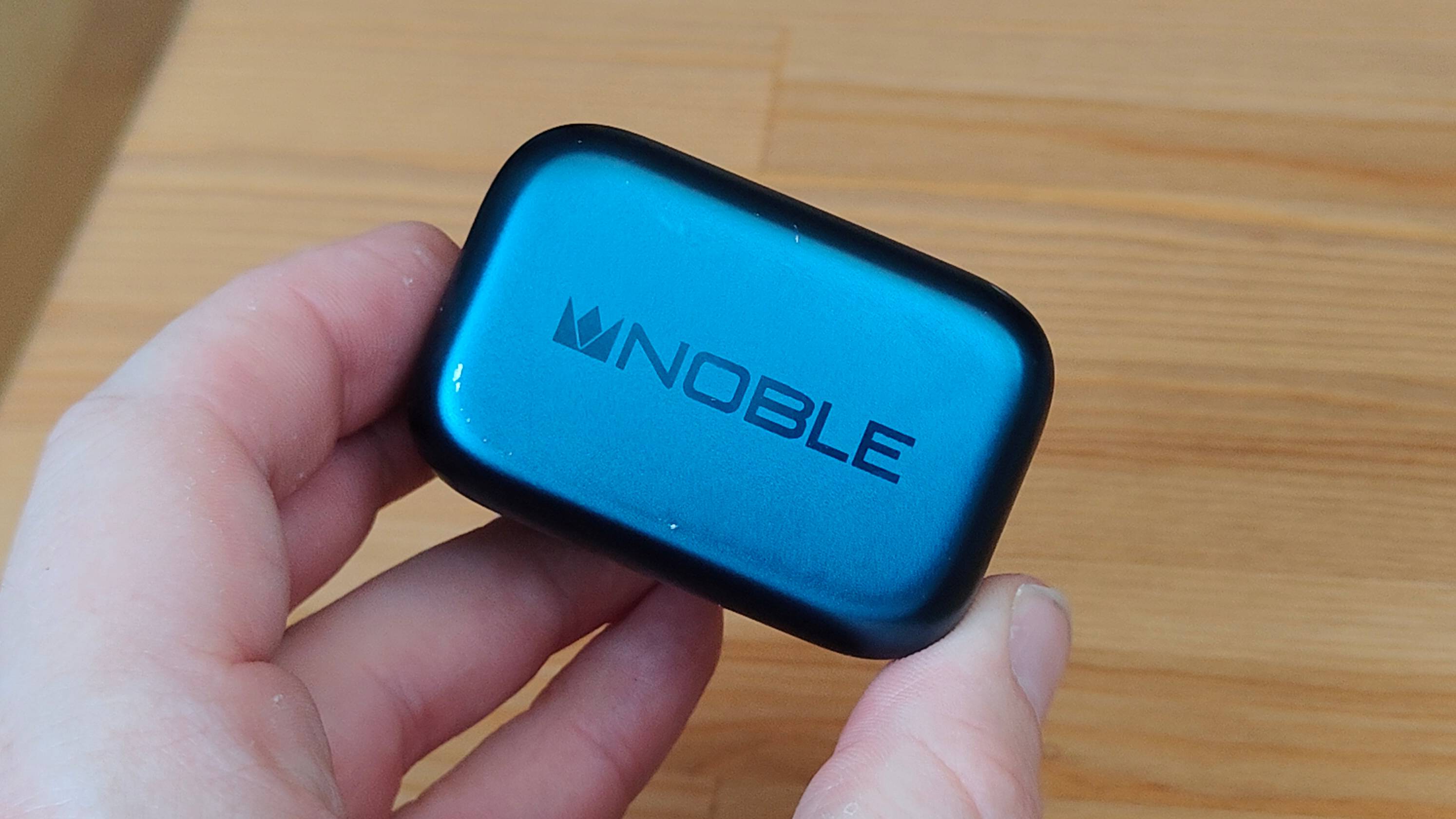 The Noble Osprey case in a man's hand.