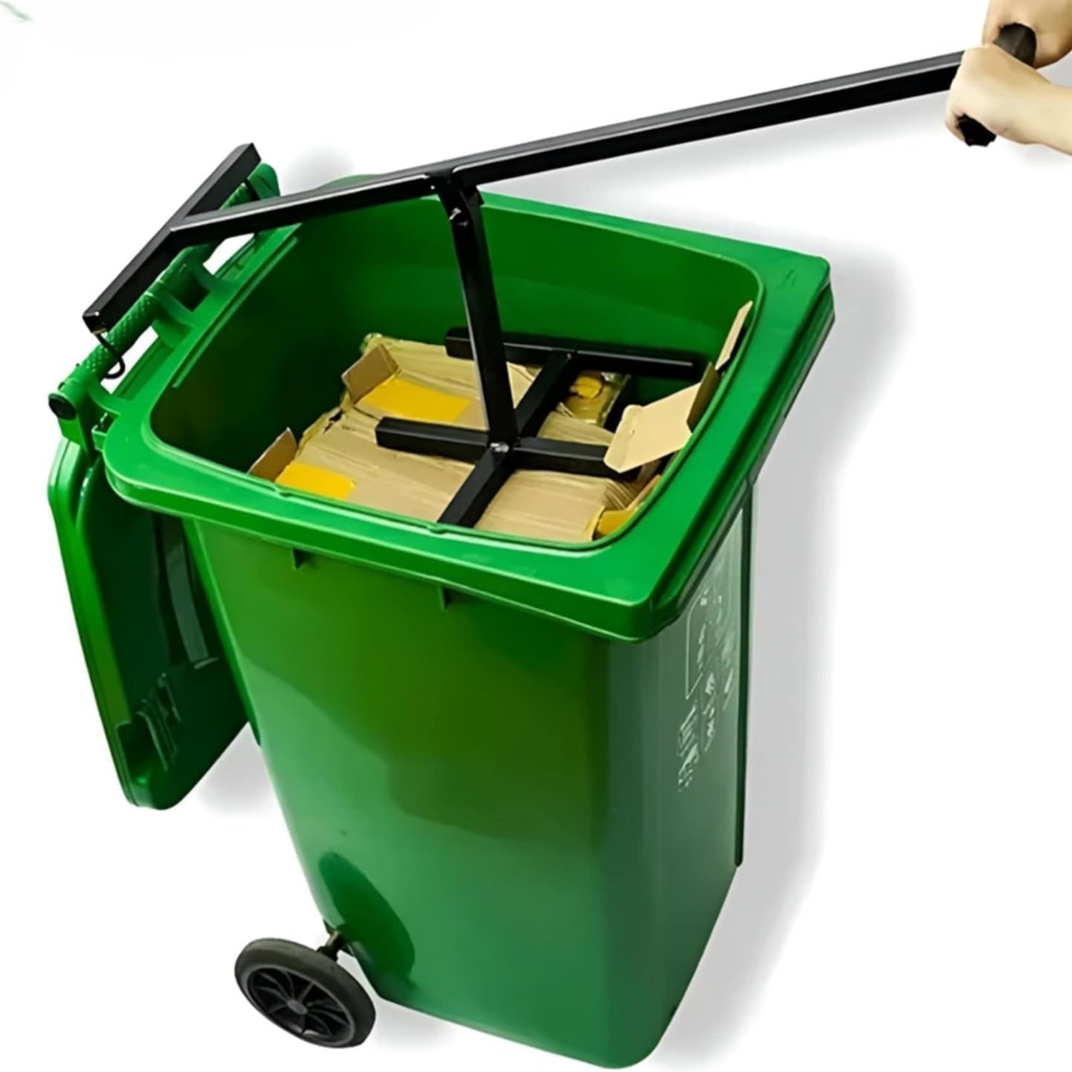 bin compactor in a green wheelie bin