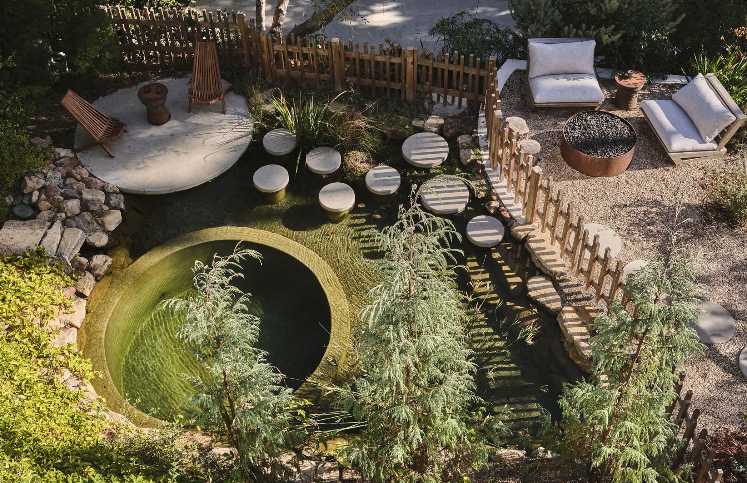 green landscape by studio Terremoto in california, peppered with light timber structures