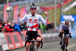 HOOGERHEIDE NETHERLANDS JANUARY 23 Eli Iserbyt of Belgium and Team Pauwels Sauzen Bingoal celebrates winning during the 32nd GP Adrie Van der Poel Hoogerheide UCI CycloCross Worldcup 2022 Mens Elite CXWorldCup on January 23 2022 in Hoogerheide Netherlands Photo by Luc ClaessenGetty Images