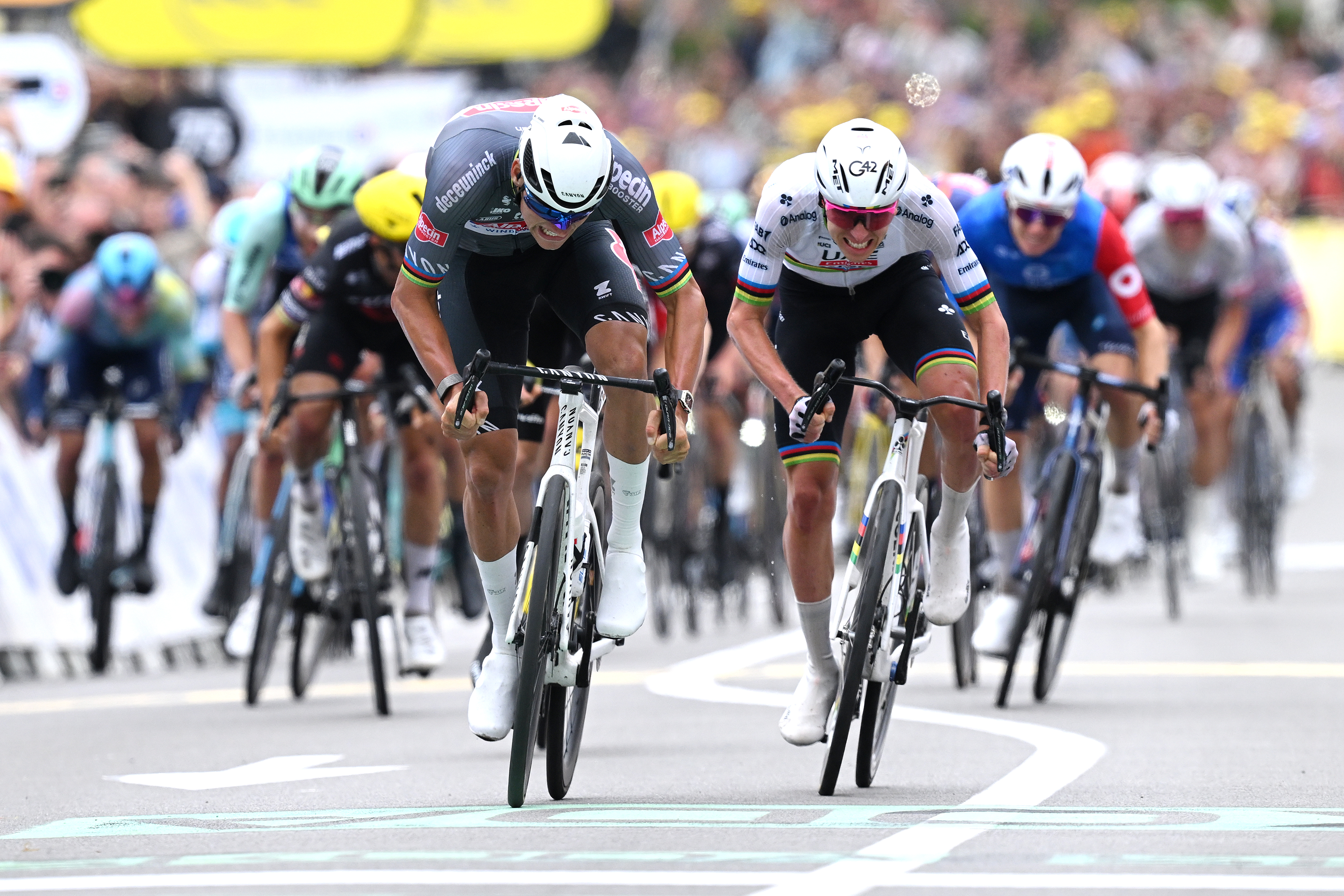 BOULOGNE-SUR-MER - JULY 06: (L-R) Stage winner Mathieu van der Poel of Netherlands and Team Alpecin - Deceuninck and Tadej Pogacar of Slovenia and UAE Team Emirates - XRG sprint at finish line during the 112th Tour de France 2025, Stage 2 a 209.1km stage from Lauwin-Planque to Boulogne-sur-Mer / #UCIWT / on July 06, 2025 in Boulogne-sur-Mer, France. (Photo by Dario Belingheri/Getty Images)