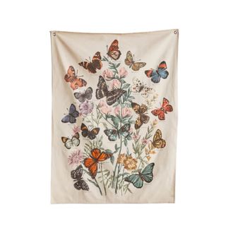 A tapestry with lots of butterflies on it