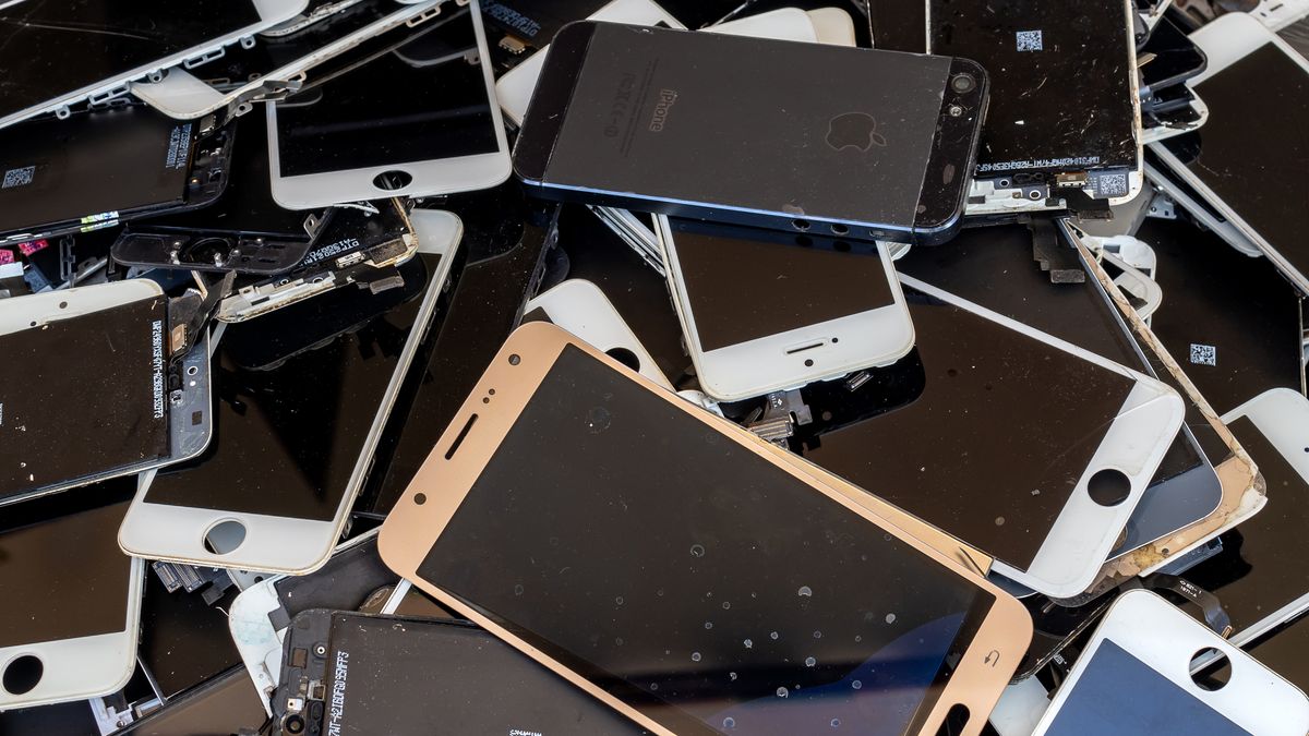 A pile of discarded smartphones