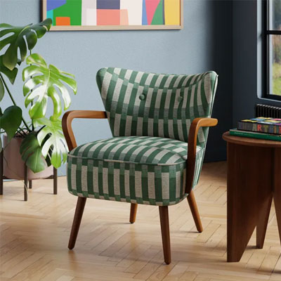 green and white retro geometric armchair with wooden frame
