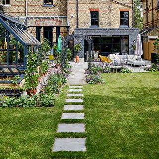 garden lawn with paver stepping stone path