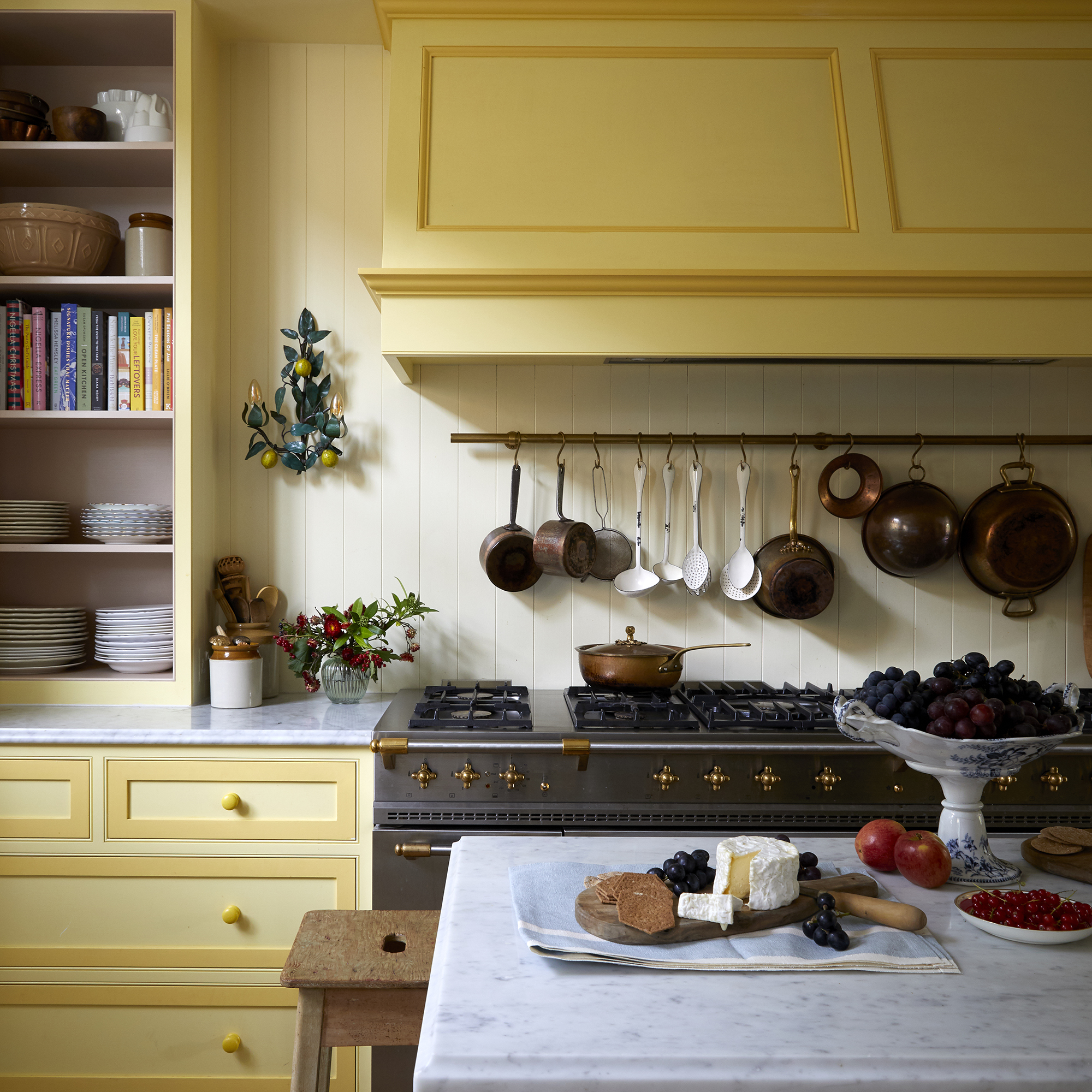 Yellow kitchen with panelling on wall