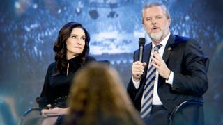 Becki Falwell and Jerry Falwell Jr sitting on stage as shown in the documentary God Forbid: The Sex Scandal That Brought Down a Dynasty