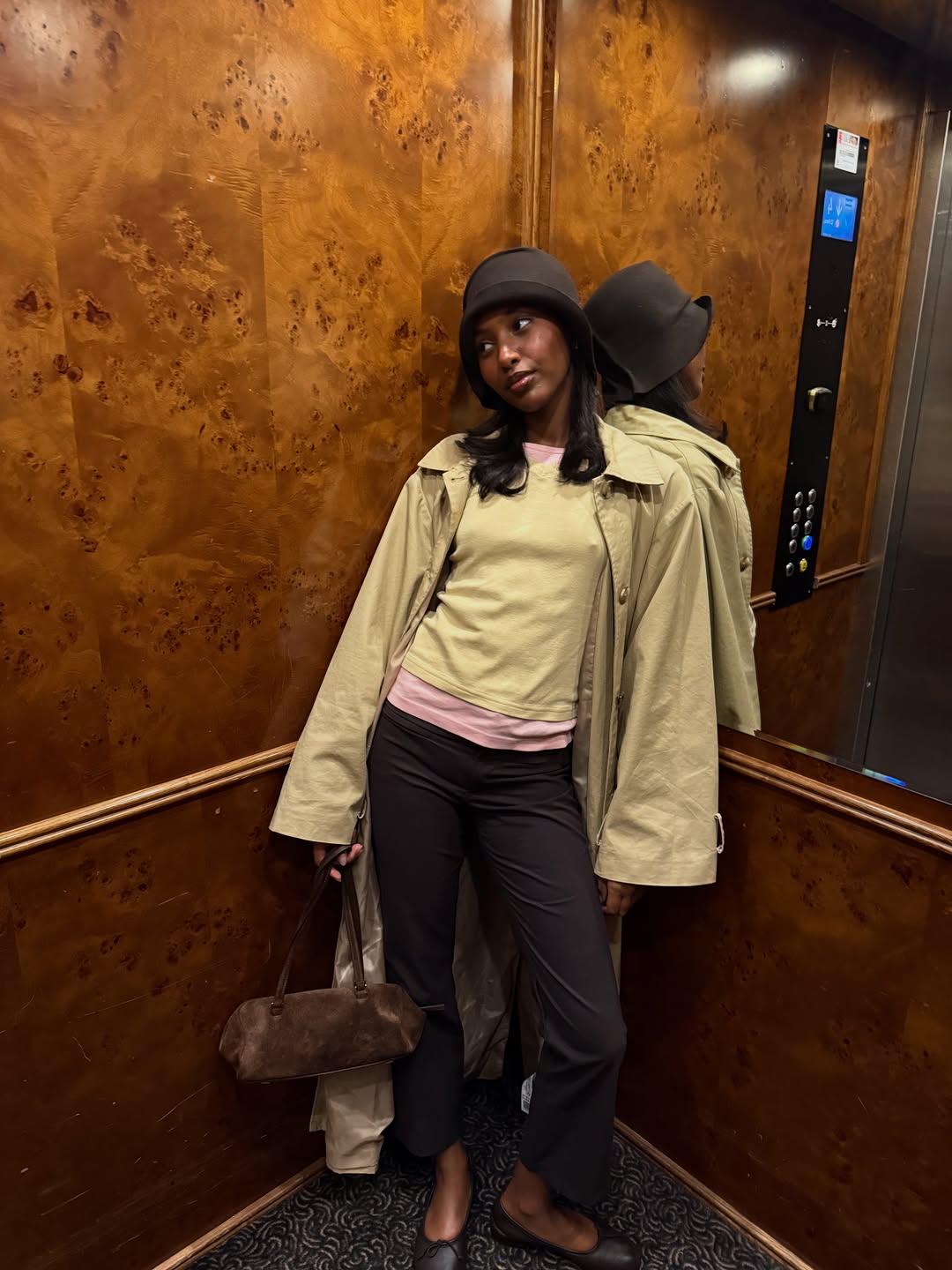 woman wearing winter to spring transitional capsule wardrobe 2026