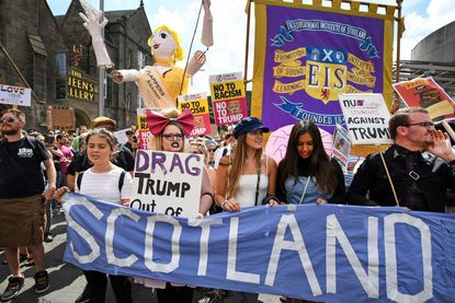 Protestors march against Trump in Scotland