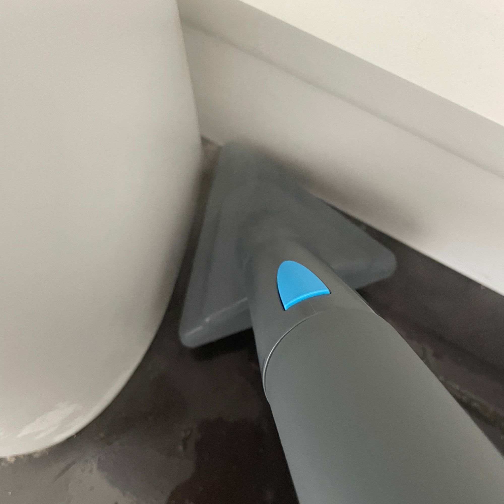 Using triangular cleaning tool of the Minky Opti-Clean Steam Cleaner