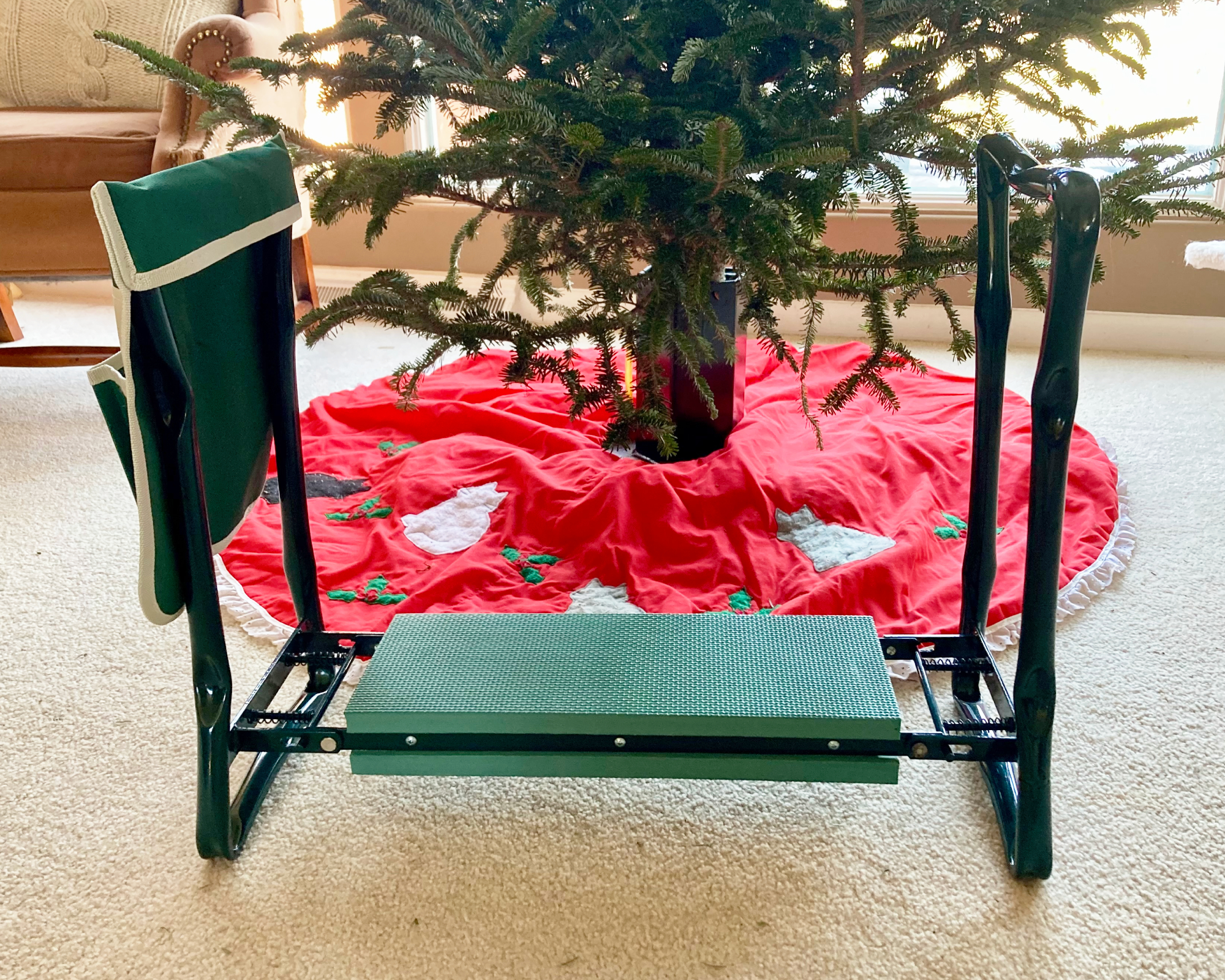 Garden kneeler under Christmas tree