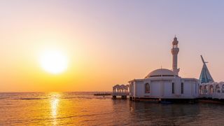 The Al-Rahmah mosque stands as an iconic symbol of Jeddah, Saudi Arabia. Constructed in 1985, this Floating Mosque is situated atop a water surface, with its foundations firmly planted beneath the sea's depths.