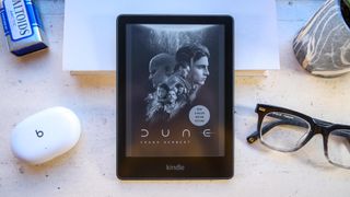 The Kindle Paperwhite 2021 with its lock screen set to Dune's cover