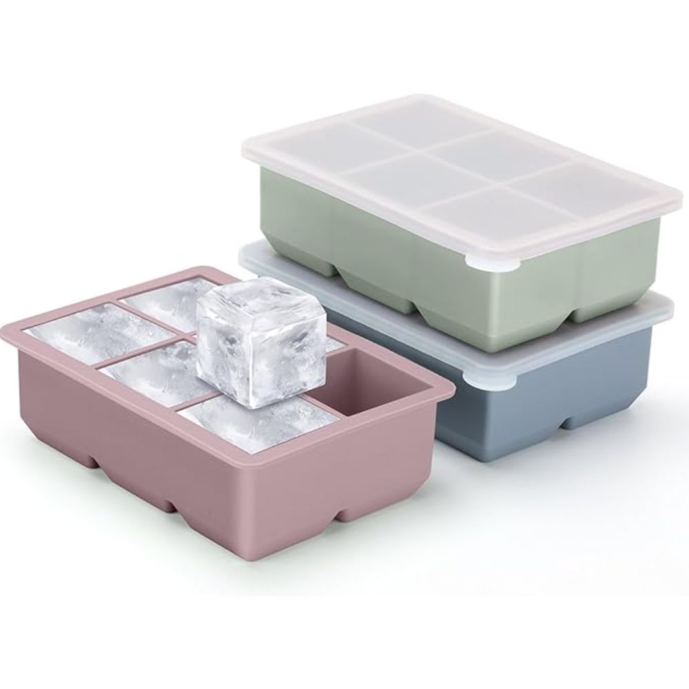 Three pastel colored ice cube molds
