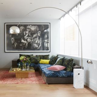 living room with rug and wooden flooring