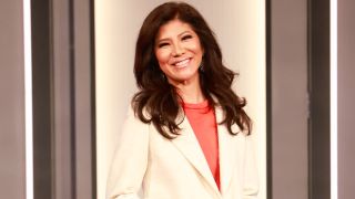 Julie Chen Moonves posing on the Big Brother Stage during the Week 2 eviction in Season 26