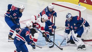 Switzerland's Pius Suter scores against USA's Joseph Woll at the 2026 IIHF World Championship