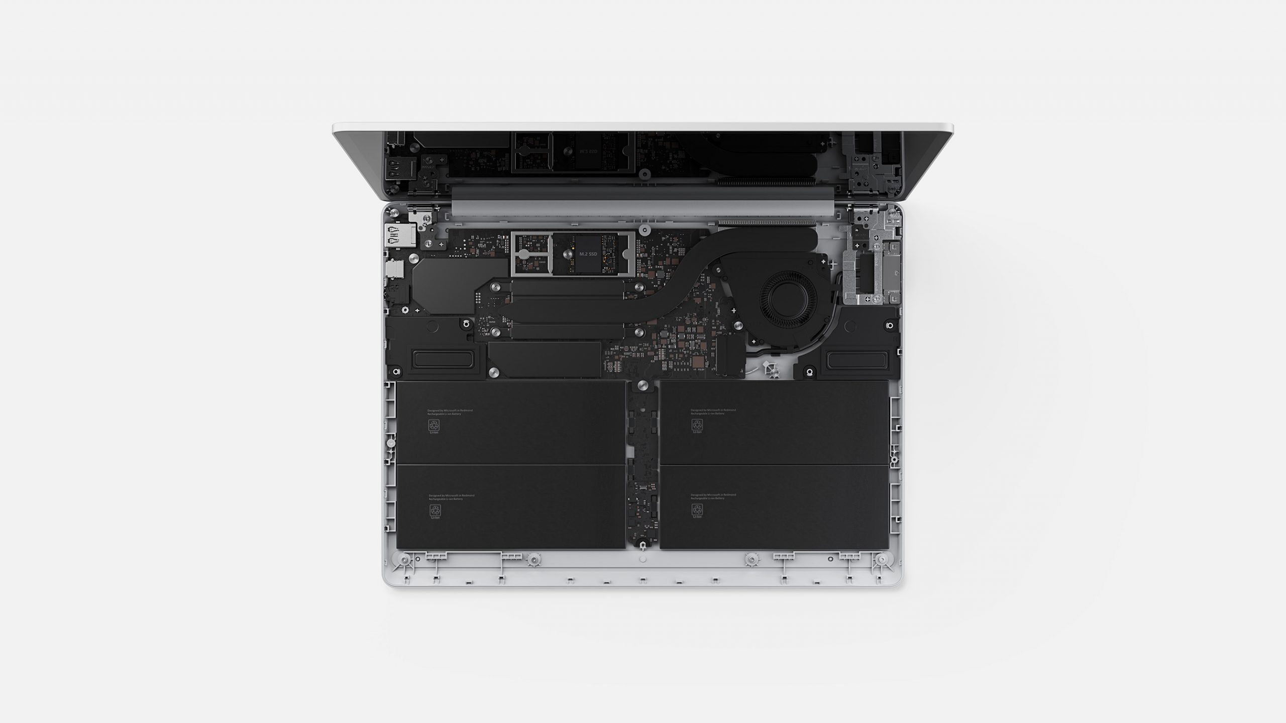 Surface Laptop Go 2 on white, with internals showing