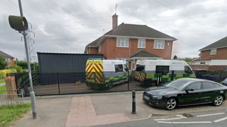 Ambulance garage owner refuses to take down massive structure after defying council's planning rules