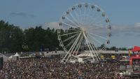 Ferris wheel and crowd at Download festival 2026