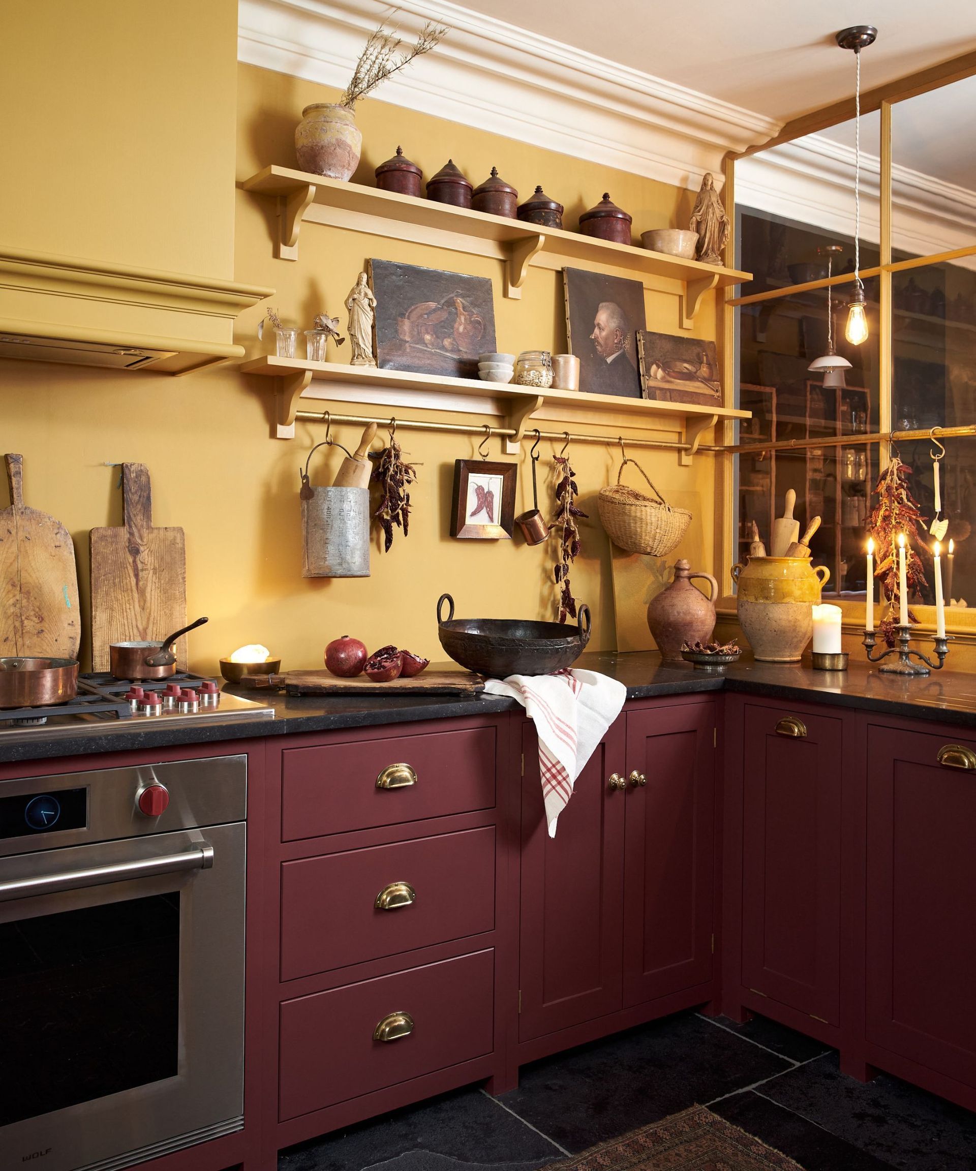 A deep red and bright yellow kitchen