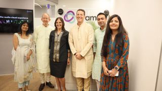 Five smiling people as Kramer opens its R&D Center in India.