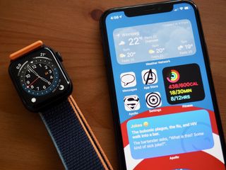 Apple Watch SE With iPhone Running Widgets