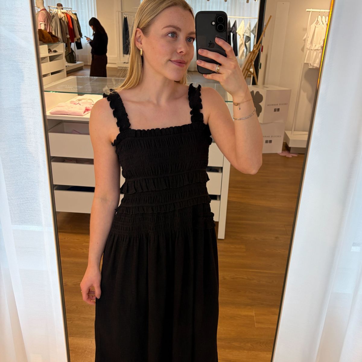 Florrie wearing black dress