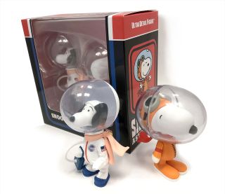 A San Diego Comic-Con exclusive set of Astronaut Snoopy figures celebrate the beagle's past and future in space.