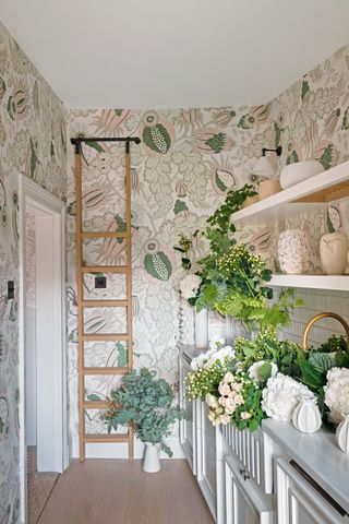 Flowers and vases in a utility room