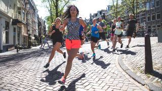 Women running in a city