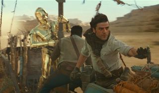 Star Wars: The Rise of Skywalker C3P0, Finn, and Poe speeding away in the desert