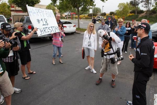 Christian Vande Velde's fans sung him happy birthday outside the team bus.