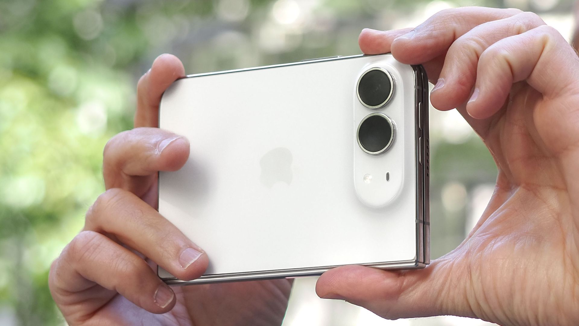 iPhone Duo shown held in hand