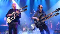 Rush&rsquo;s Alex Lifeson and Geddy Lee performing onstage in LA on June 7