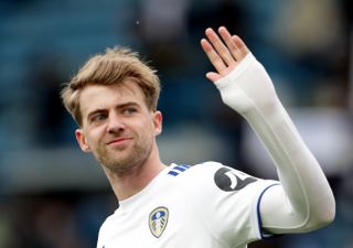 Leeds United’s Patrick Bamford salutes the fans after the final whistle during the Premier League match at Elland Road, Leeds. Picture date: Sunday May 23, 2021