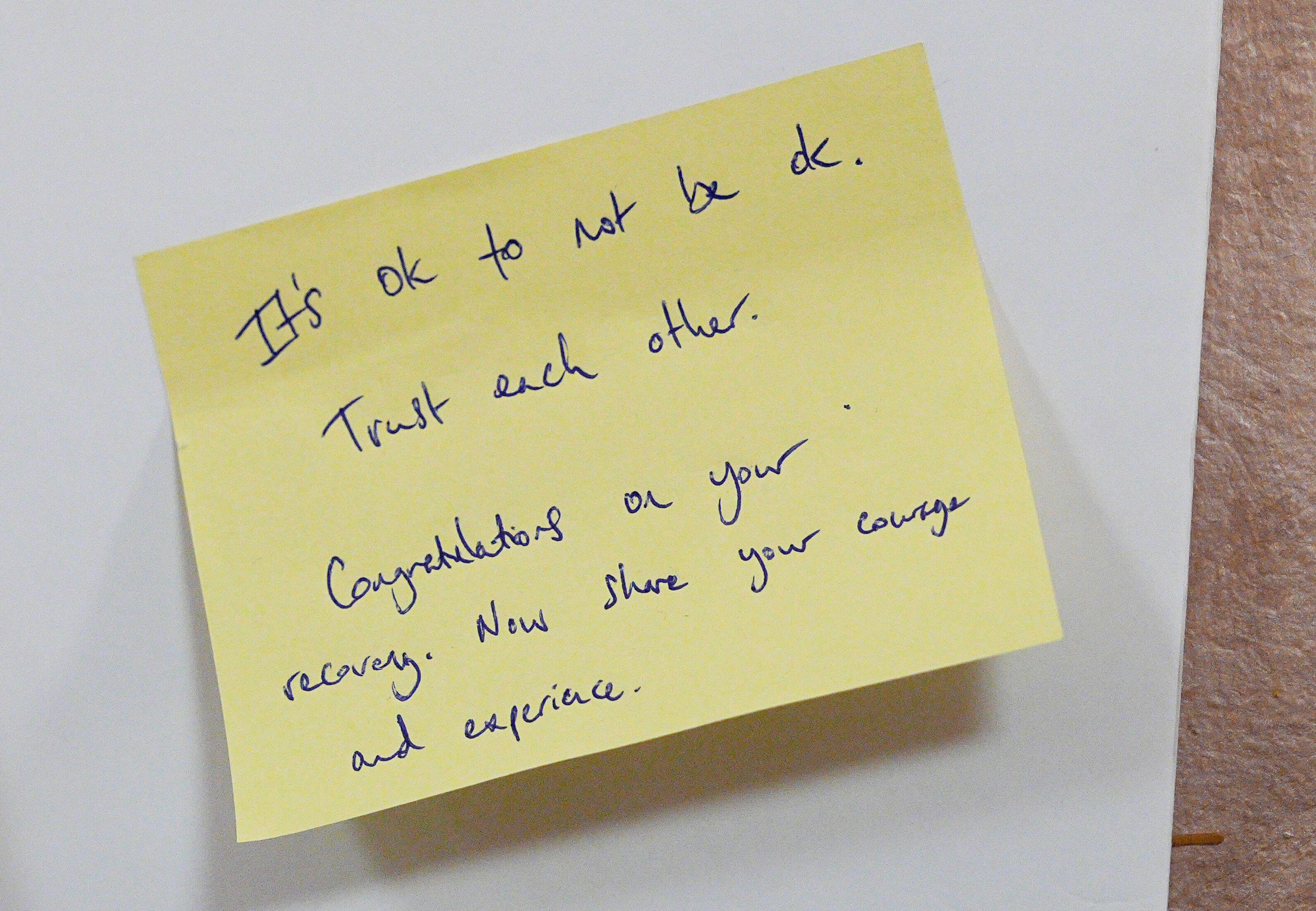 A yellow post-it note written by Prince Harry reading &amp;quot;it's ok not to be ok&amp;quot;