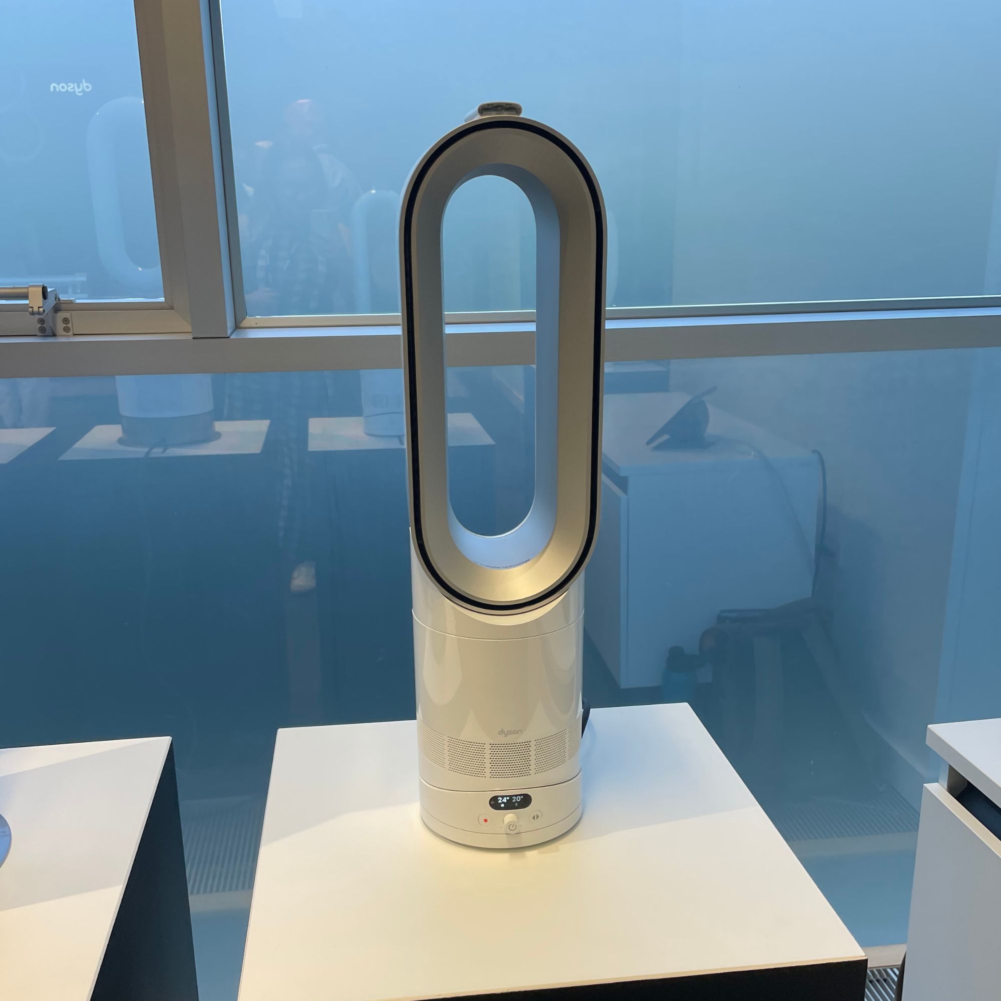 Dyson Hot+Cool HF1 Fan Heater on a white plinth