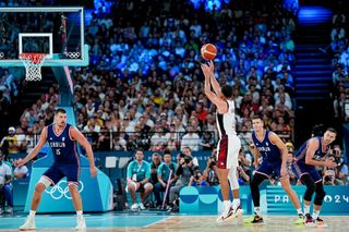 Stephen Curry of the United States takes a three-point shot during the Men&#039;s Semifinal Game between United States and Serbia on day thirteen of the Olympic Games Paris 2024 at Arena Bercy on August 8, 2024