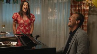 Cobie Smulders singing and Jason Segel singing and playing piano in Shrinking. 