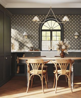 white and gray kitchen with gray art deco style wallpaper, white wall lights,table and chairs, wooden floor,