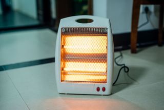 A halogen heater in the middle of a room