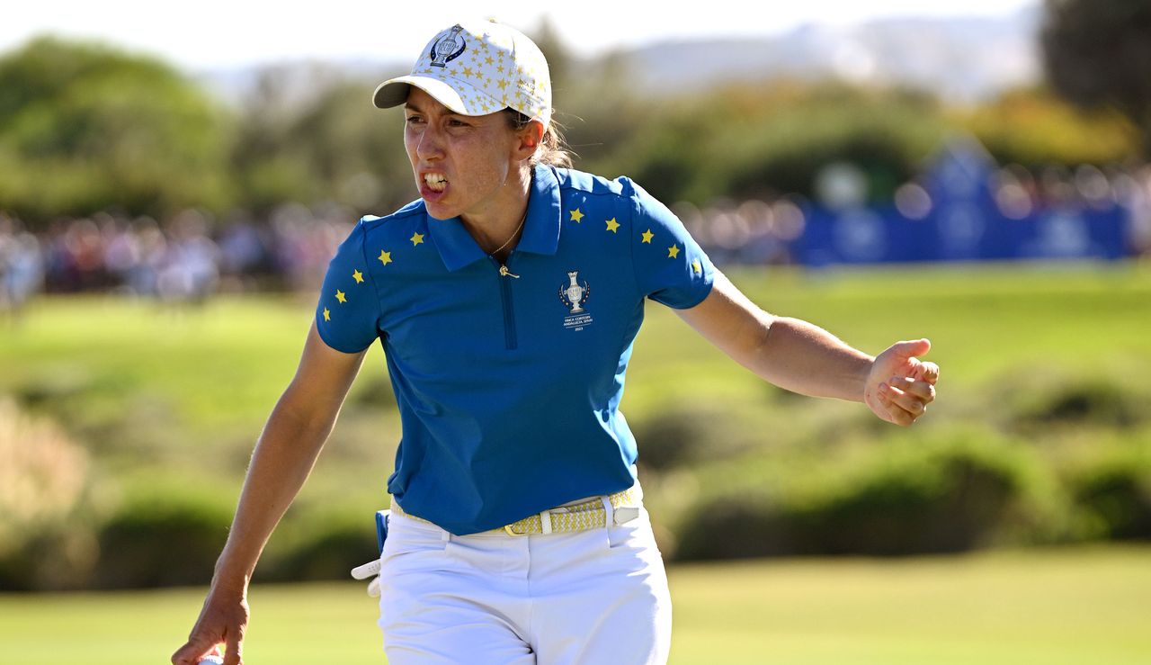 Carlota Ciganda fist pumps whilst on the green