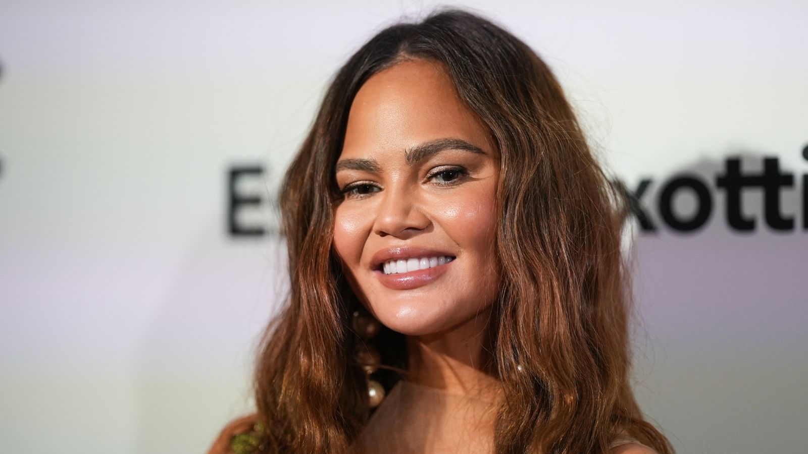 Chrissy Teigen's intricate shelves have reimaged how we decorate our kitchens for the holidays – it's the solution for a notoriously hard-to-decorate space