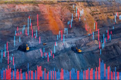 Commodities - open pit iron ore mine on economic data background
